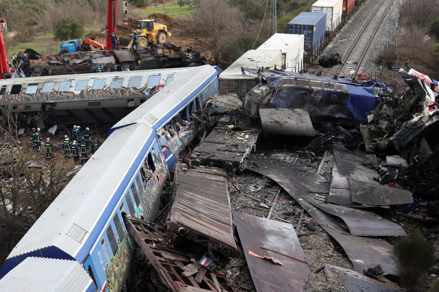 Destroyed train carriages are seen at the site of a crash, where two trains collided, near the city of Larissa, Greece, March 1, 2023. REUTERS/Alexandros Avramidis