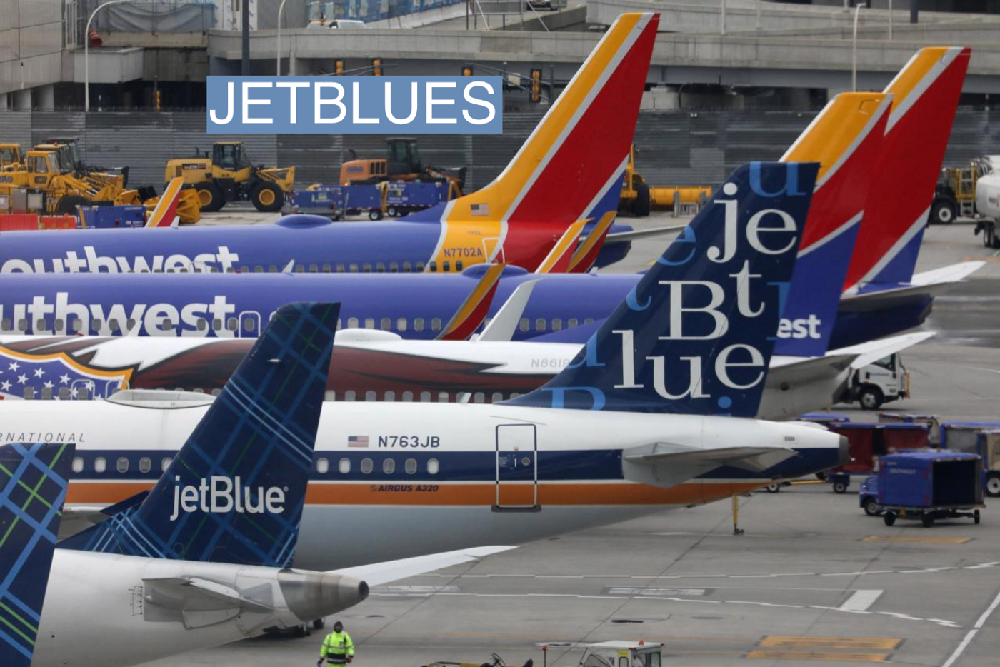 JetBlue and Southwest Airlines planes are parked at the LaGuardia Airport in New York City, U.S. March 4, 2023.