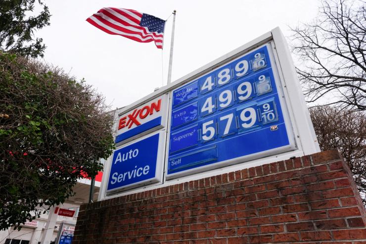 A board displays gas prices amid the ongoing conflict with US-Israeli conflict with Iran