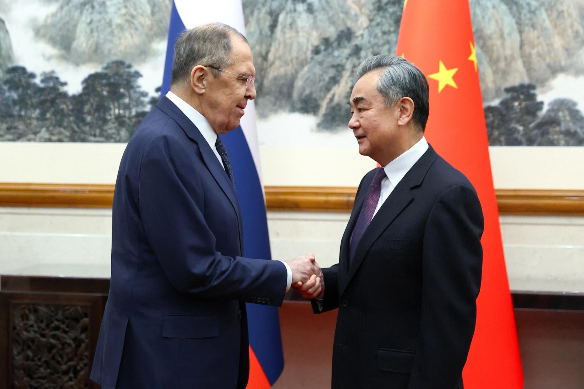 Russia's Foreign Minister Sergei Lavrov shakes hands with China's Foreign Minister Wang Yi during a meeting in Beijing, China April 9, 2024. Russian Foreign Ministry/Handout via REUTERS 