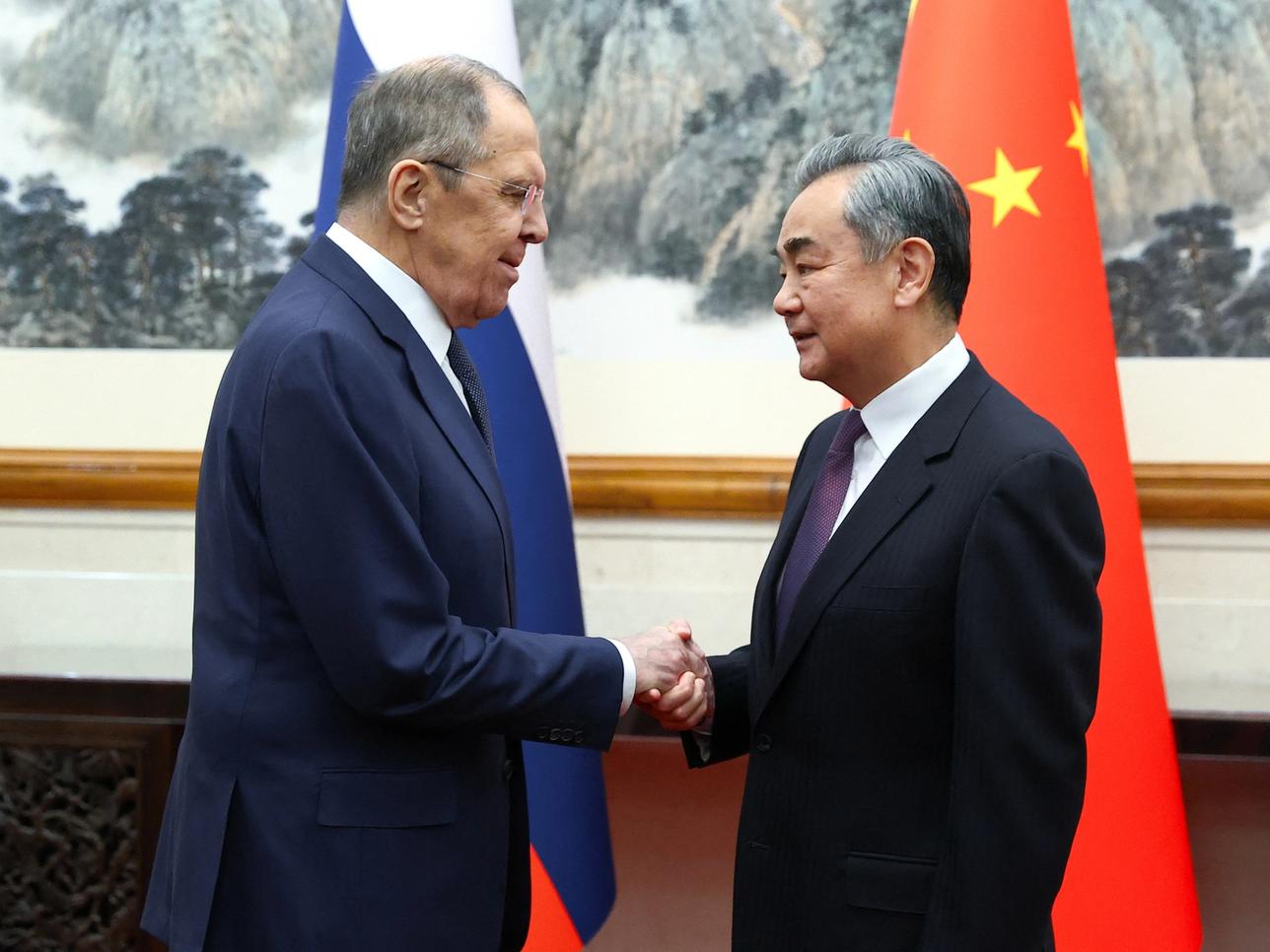 Russia's Foreign Minister Sergei Lavrov shakes hands with China's Foreign Minister Wang Yi during a meeting in Beijing, China April 9, 2024. Russian Foreign Ministry/Handout via REUTERS 