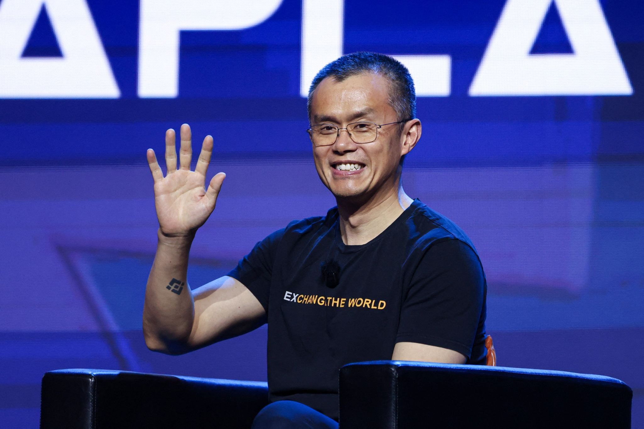 Binance founder Changpeng Zhao, also known as CZ, gestures at the Bitcoin Asia conference, in Hong Kong, China, Aug.27, 2026.