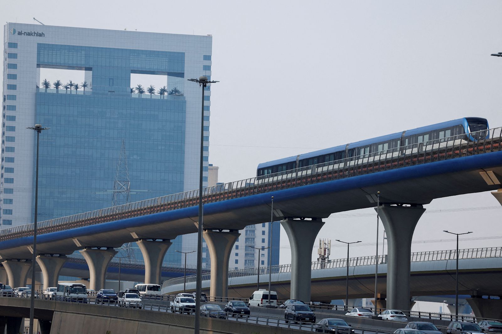 A train approaches the King Abdullah Financial District Metro Station in Riyadh. 