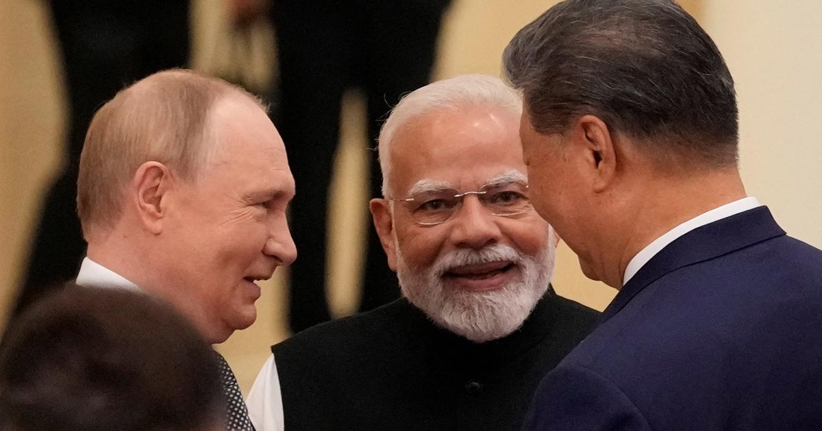 Modi embraces Putin, Xi at China summit