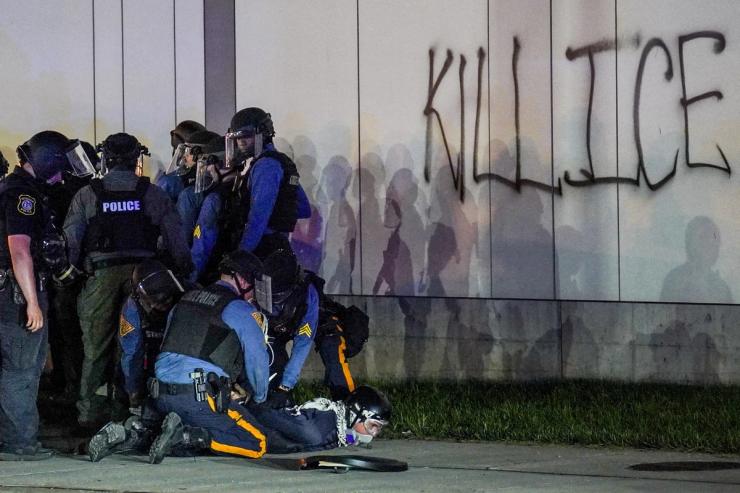 An anti-ICE protester is arrested