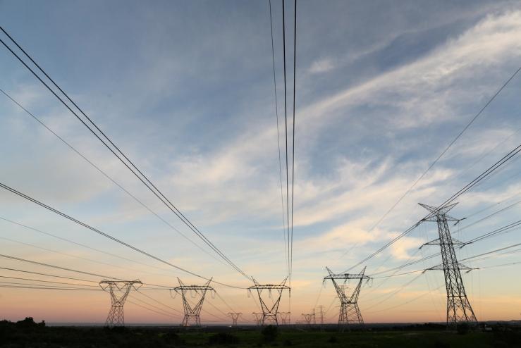 Electricity pylons carrying power from Koeberg nuclear power plant are seen in Cape Town.