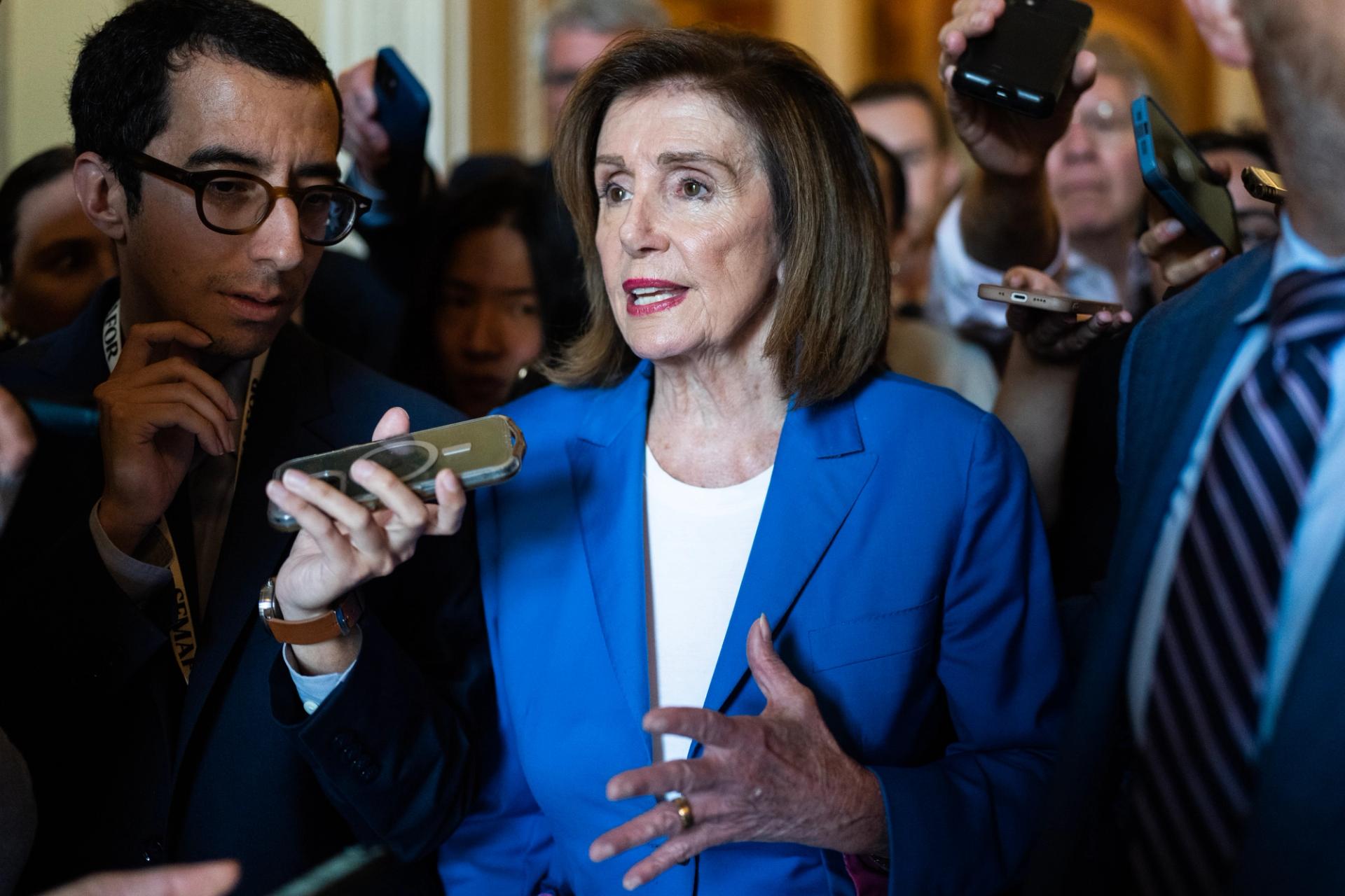 Rep. Nancy Pelosi, D-Calif., talks with reporters in the U.S. Capitol about the presidential debate between President Joe Biden and former President Donald Trump, on Friday, June 28, 2024. 