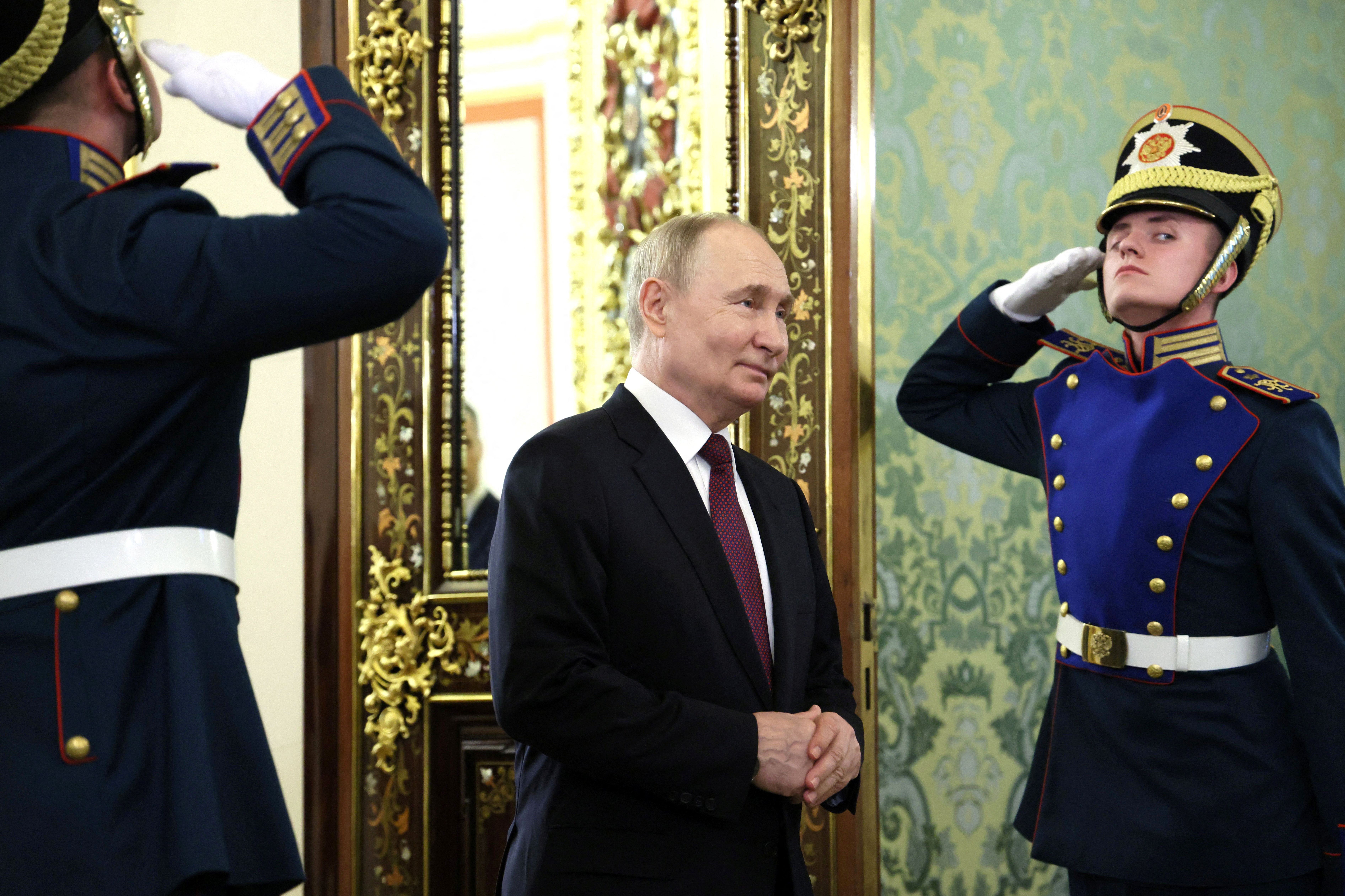 Russia’s President Vladimir Putin walks to meet President of the Republic of the Congo Denis Sassou Nguesso at the Kremlin in Moscow, Russia June 27, 2024. Sputnik/Mikhail Metzel/Pool via REUTERS