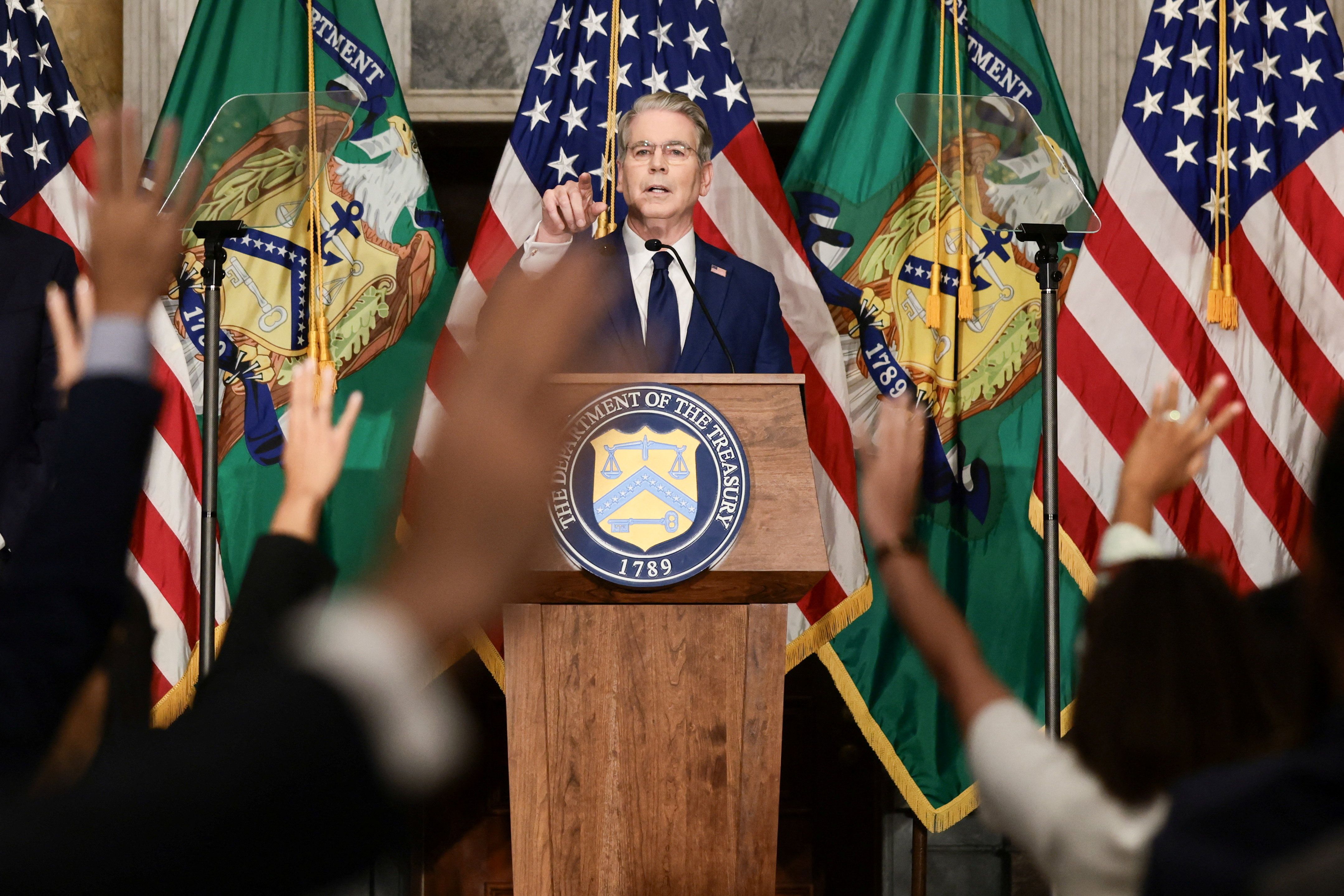 US Treasury Secretary Scott Bessent points at reporters during a press conference on new sanctions on Iran