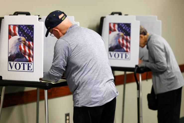 Citizens mark their ballots at an early voting site inside the Greensboro Coliseum complex.