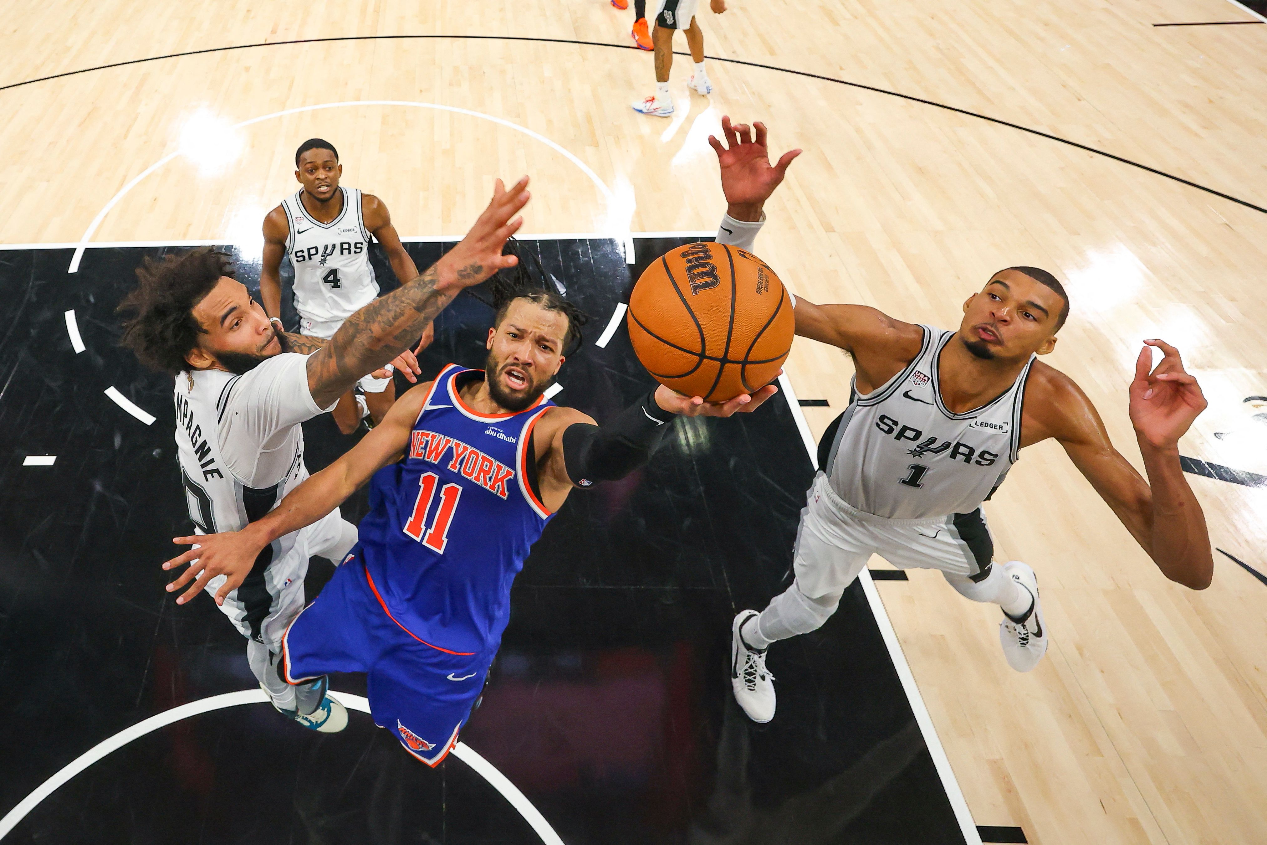 New York Knicks guard Jalen Brunson drives to the basket