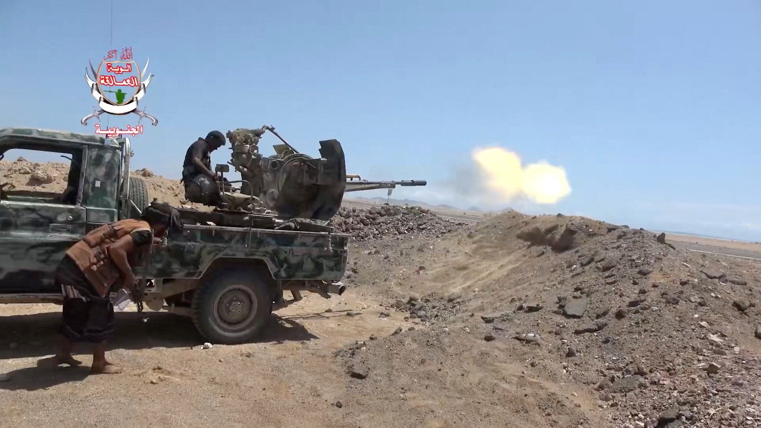 A pro-Saudi-backed Yemeni government fighter fires a vehicle-mounted weapon near Dhubab, Taiz Governorate, Yemen, Oct. 5, 2026.
