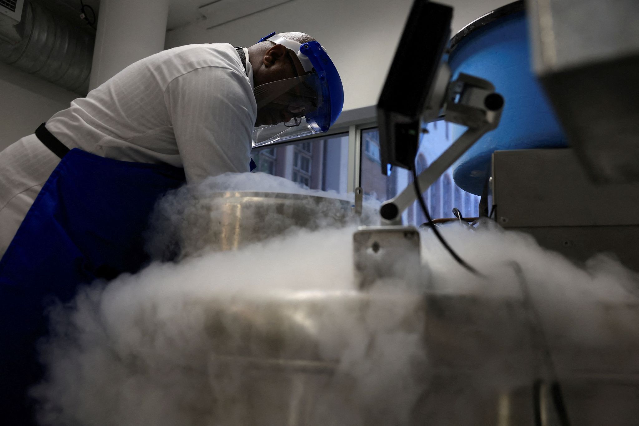 Scientific officer Asiphe Besethi works in the research lab at the University of Cape Town’s Institute of Infectious Disease and Molecular Medicine.