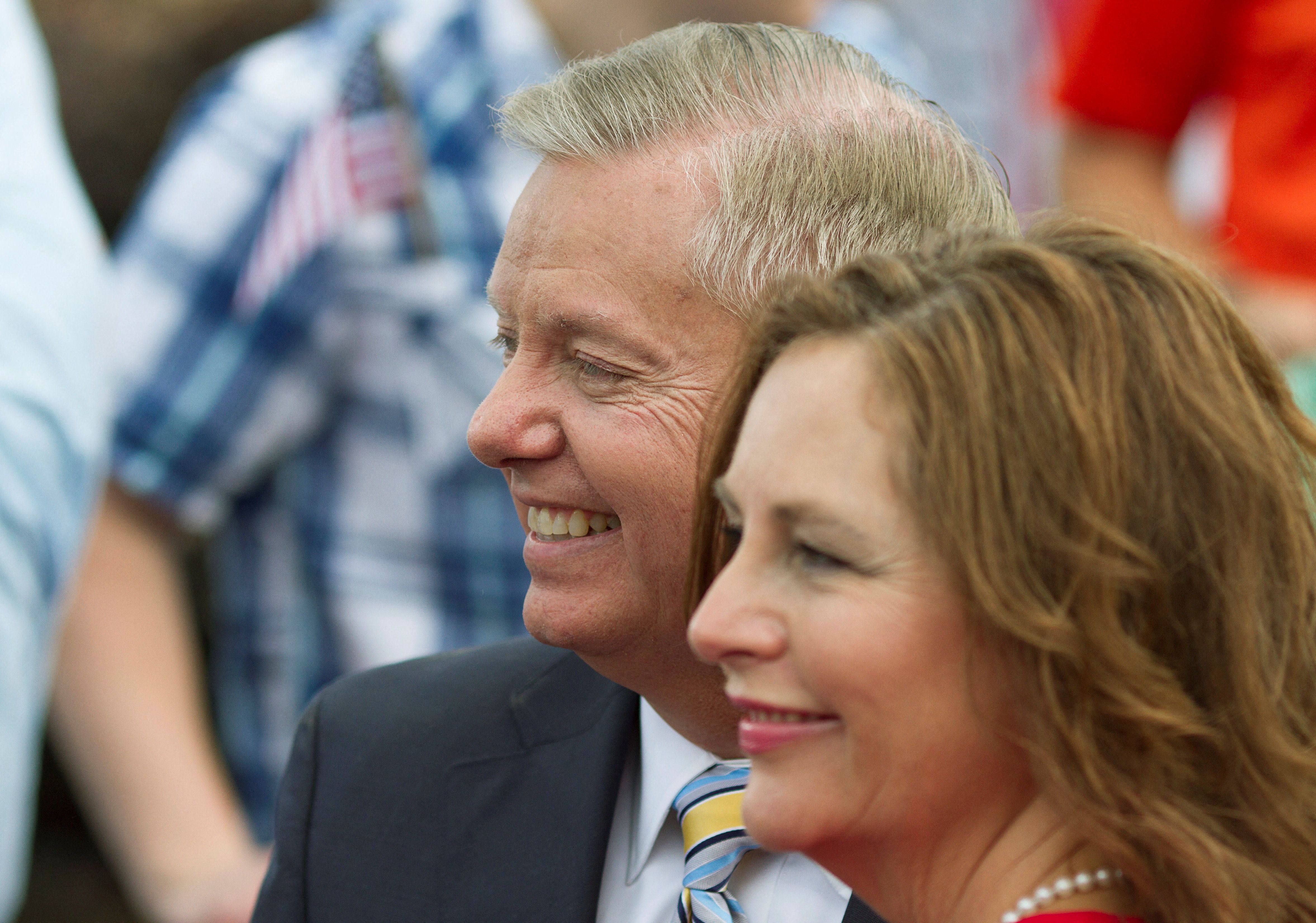 Senator Lindsey Graham stands with his sister Darline Graham Nordone