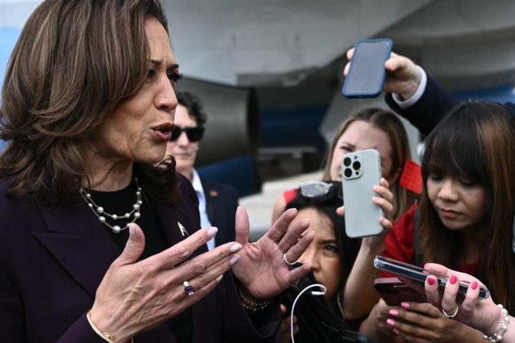 US Vice President and Democratic presidential candidate Kamala Harris speaks to reporters upon arrival at Joint Base Andrews in Maryland on July 25, 2024.