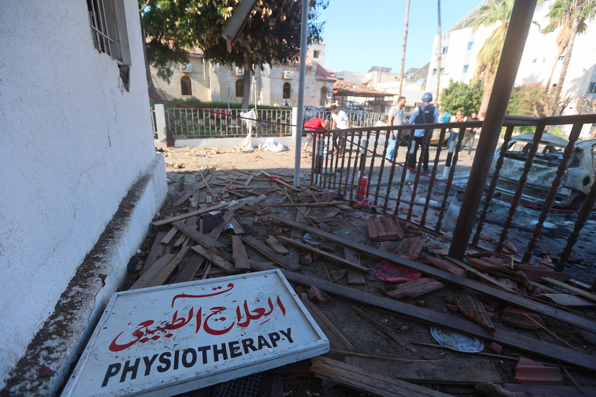 A view of debris in the area of Al-Ahli hospital where Palestinians were killed in a blast