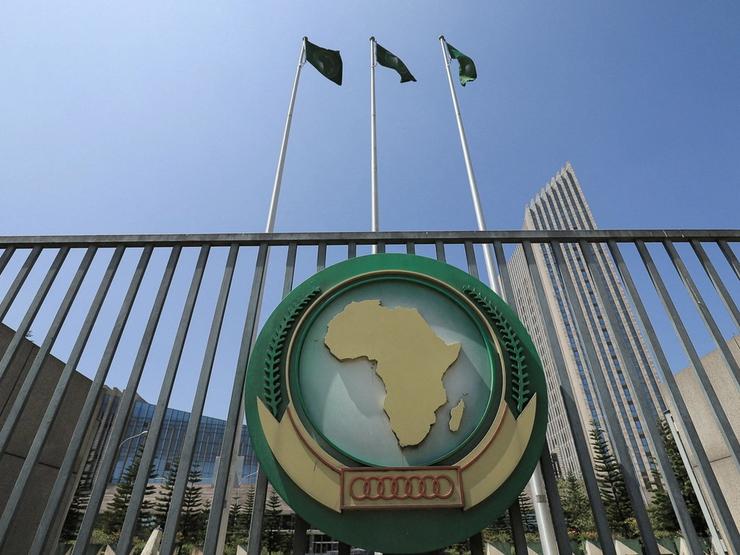 The African Union logo is seen outside the AU headquarters.