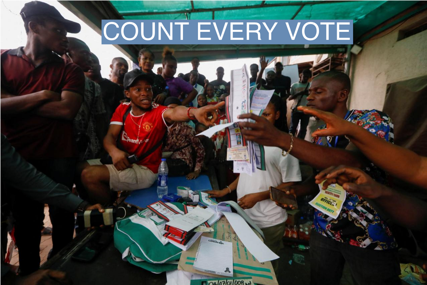 People react during the counting process of Nigeria's presidential election, at a polling unit in Awka, Anambra state, Nigeria February 25, 2023. 
