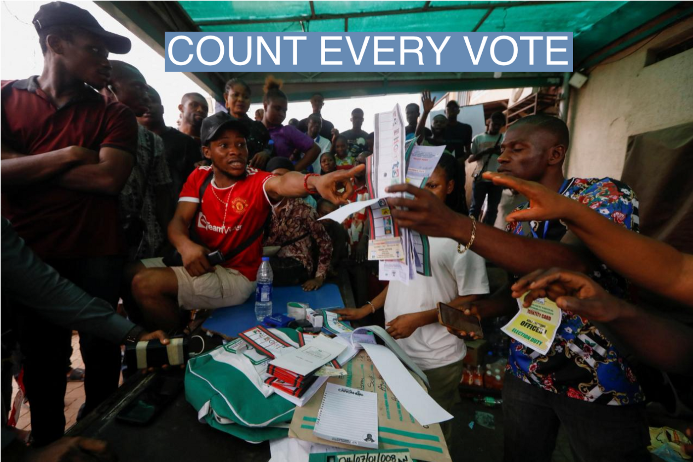 People react during the counting process of Nigeria's presidential election, at a polling unit in Awka, Anambra state, Nigeria February 25, 2023.