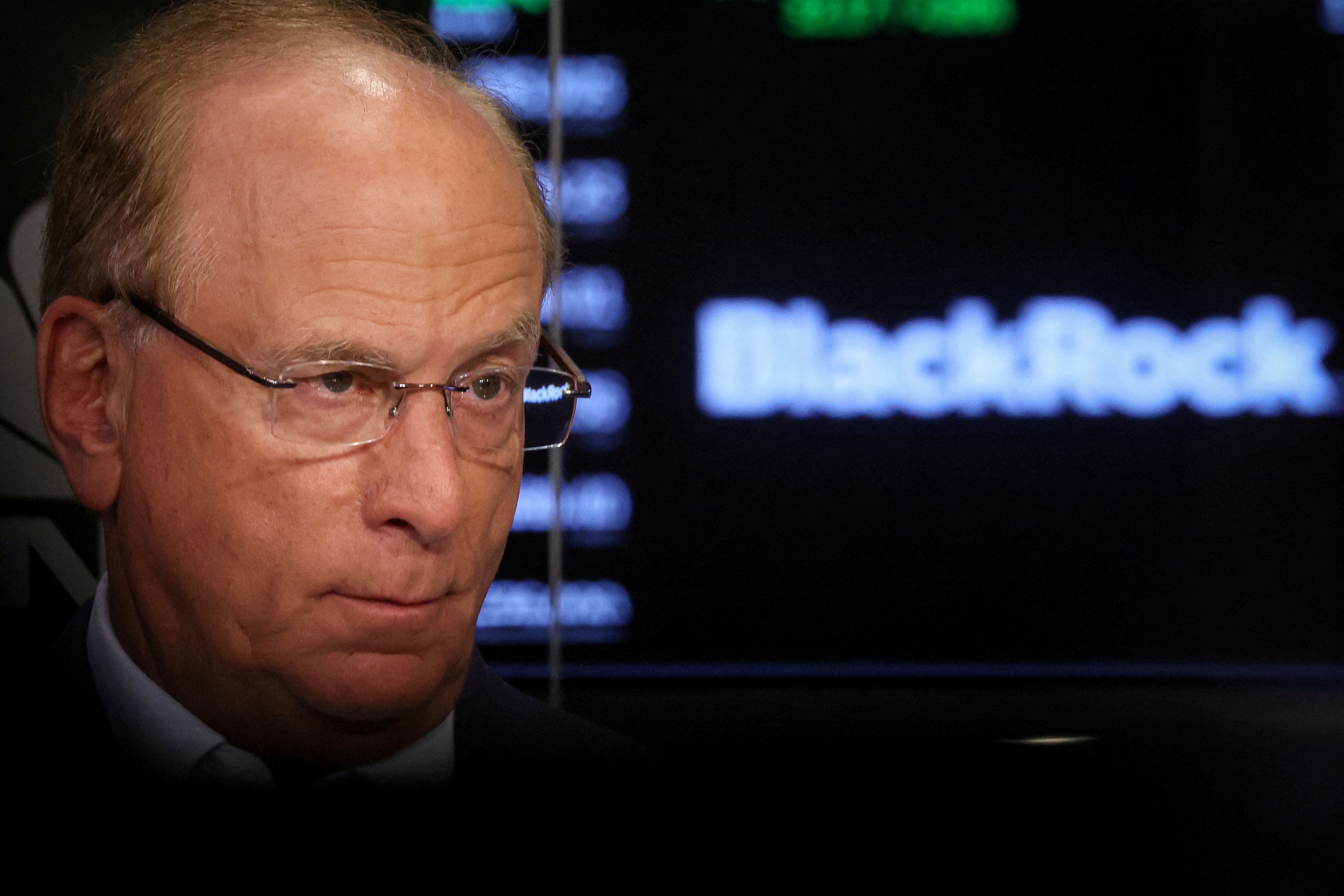 Larry Fink, Chairman and CEO of BlackRock, speaks during an interview with CNBC on the floor of the New York Stock Exchange in 2023.