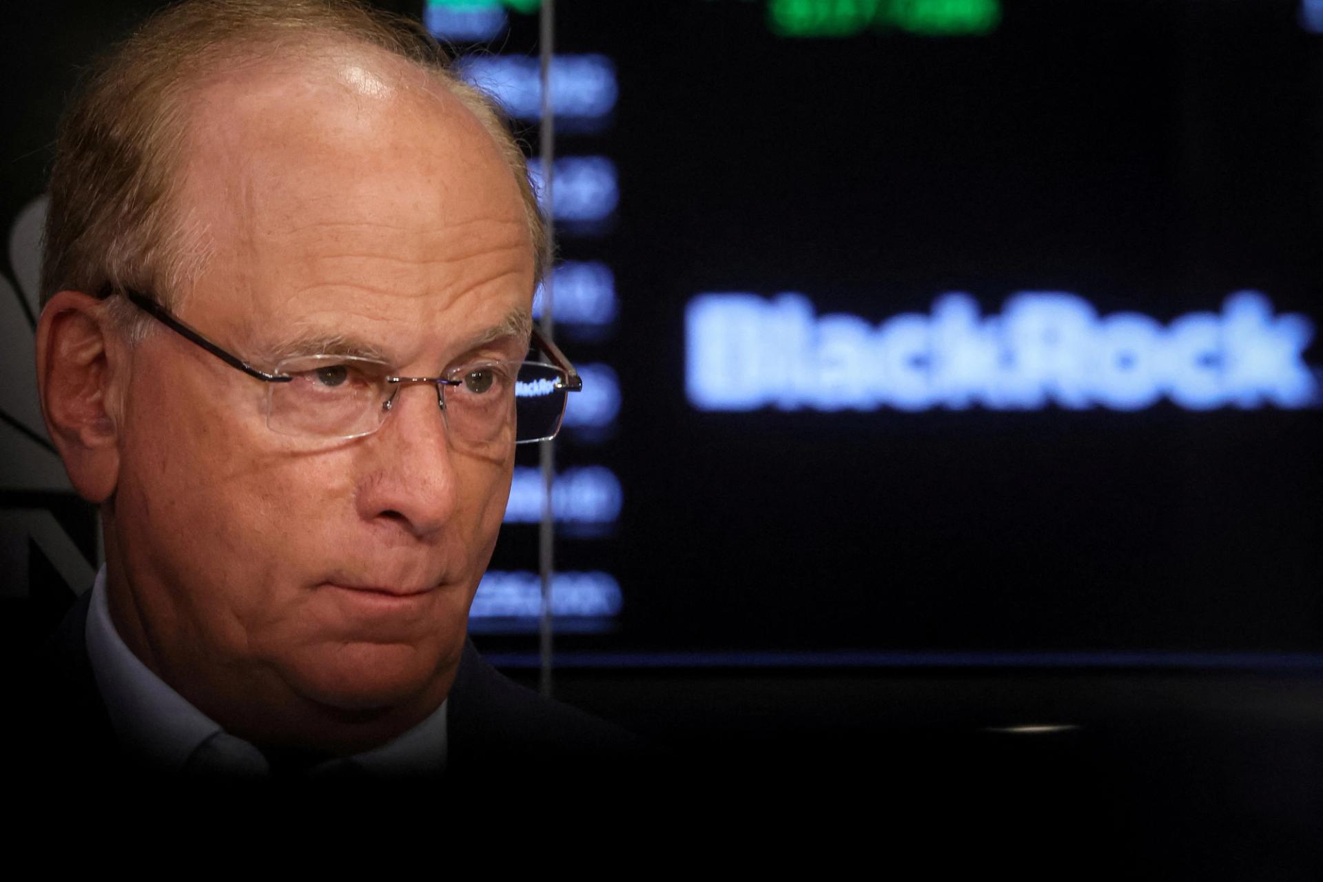 Larry Fink, Chairman and CEO of BlackRock, speaks during an interview with CNBC on the floor of the New York Stock Exchange in 2023.