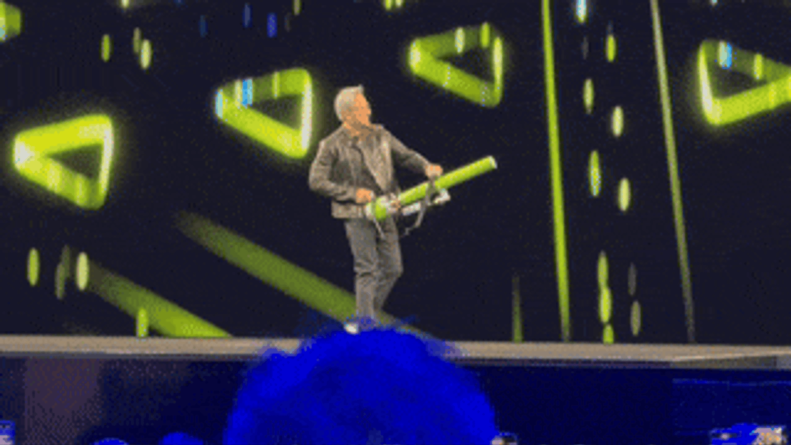 Nvidia CEO Jensen Huang using a reloader during the company’s annual conference in San Jose.
