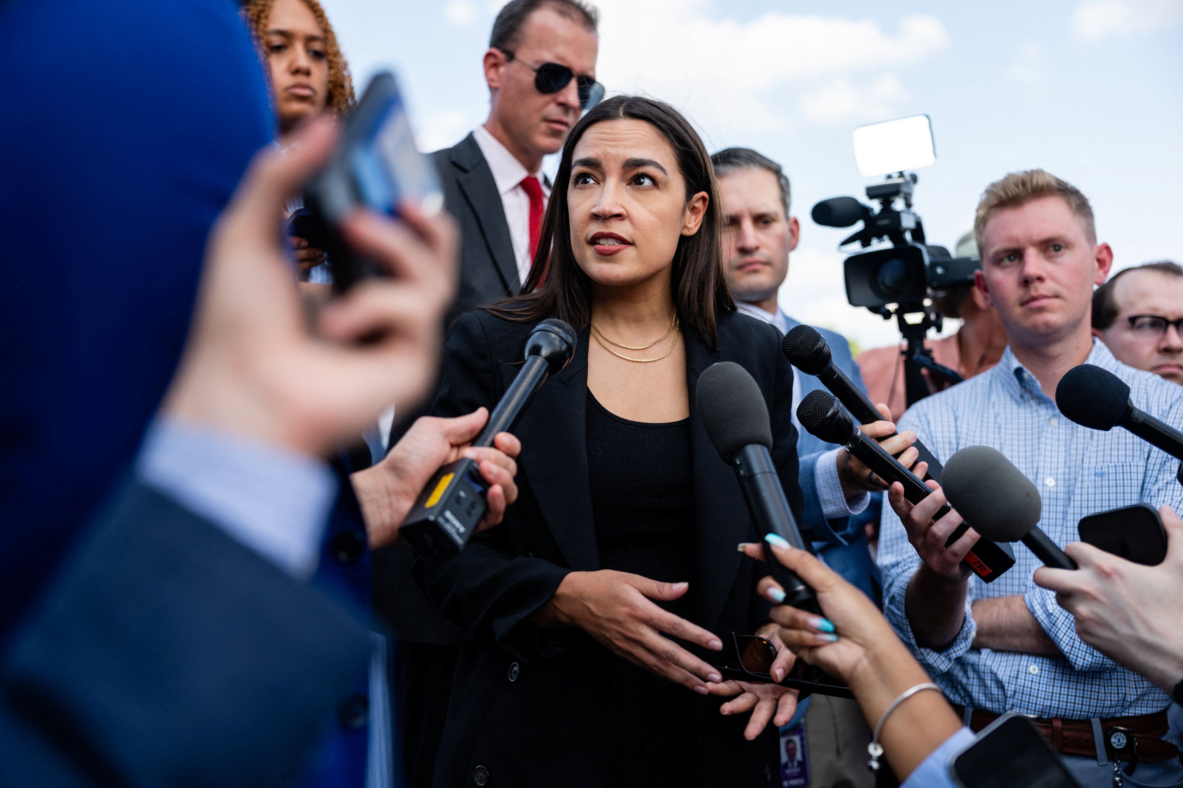U.S. Representative Alexandria Ocasio-Cortez (D-NY) speaks with reporters after the House of Representatives passed its version of the fiscal 2027 National Defense Authorization Act (NDAA) on Capitol Hill in Washington, D.C., U.S., July 22, 2026. 