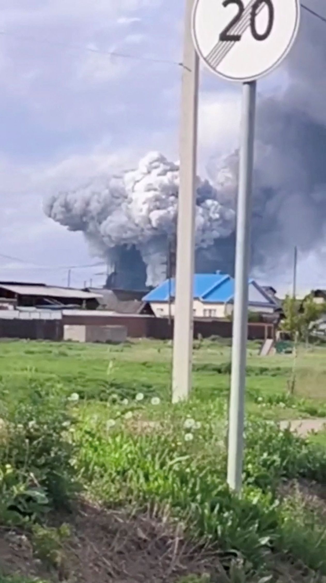 Smoke rises over Sredny in Russia’s Irkutsk region after a drone strike