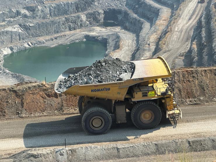 A hauling truck transports blasted ore at the Mogalakwena open-pit platinum mine.