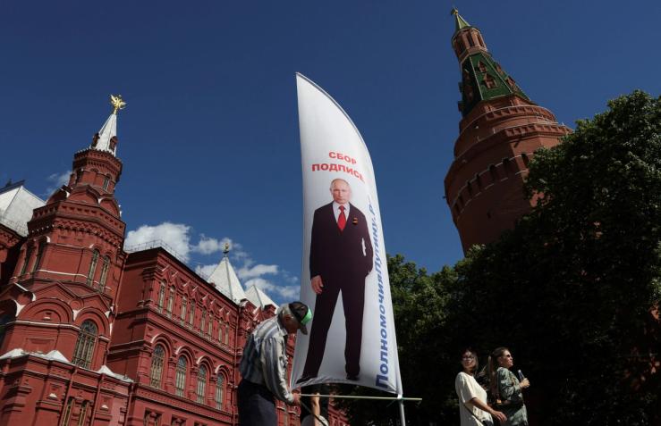 A poster of Putin in the Kremlin.