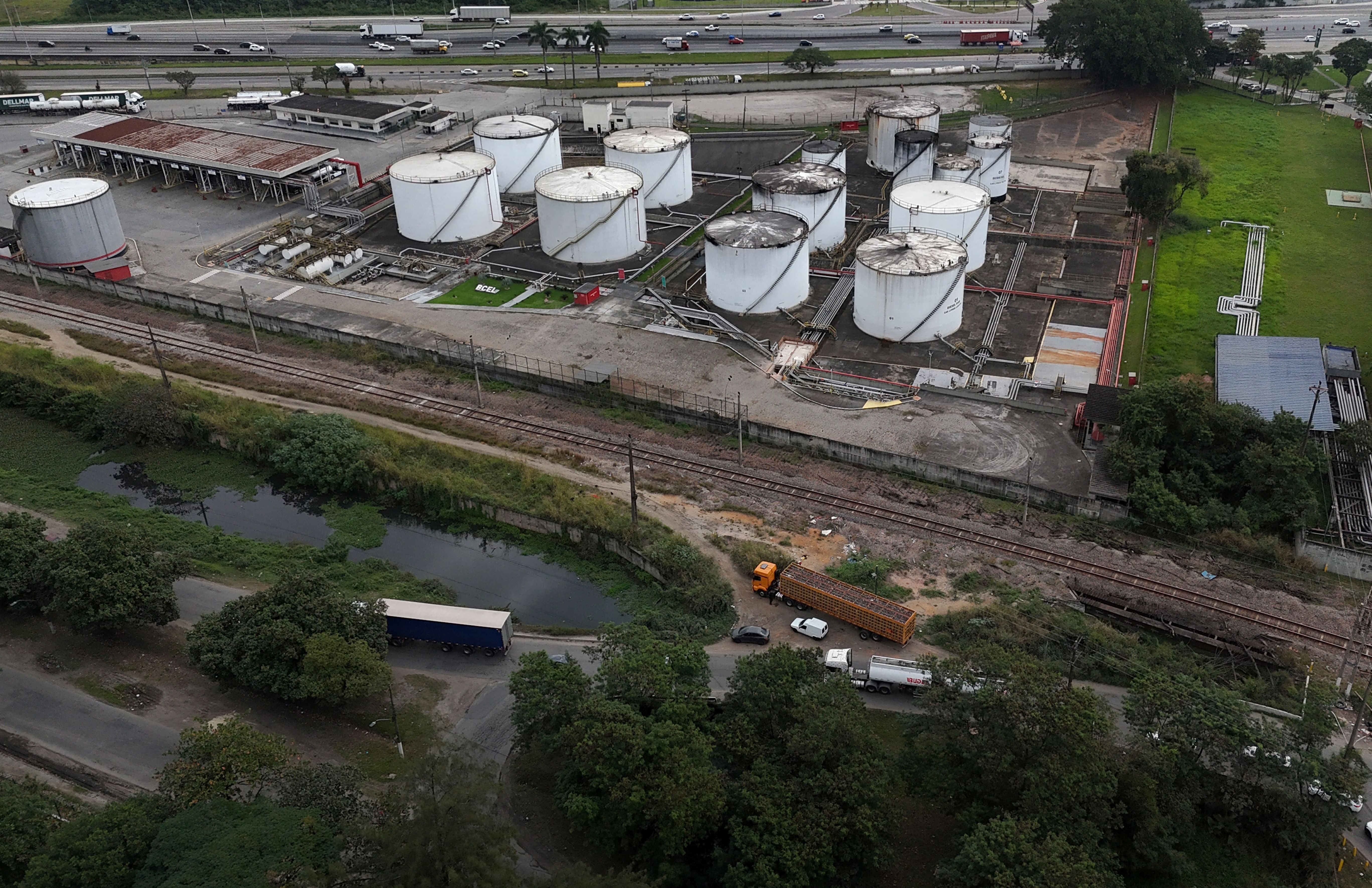 A drone view of stage tanks at an industrial fuel and biofuel logistics facility.