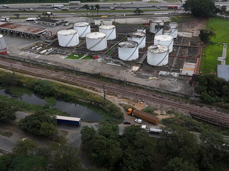 A drone view of stage tanks at an industrial fuel and biofuel logistics facility.