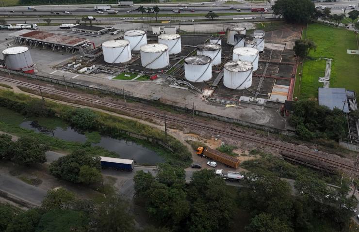 A drone view of stage tanks at an industrial fuel and biofuel logistics facility.