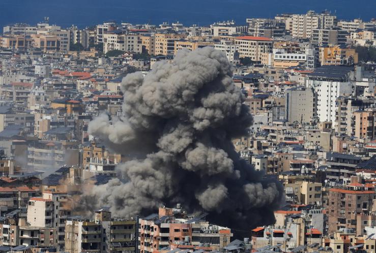 Smoke rises after a strike on Beirut.
