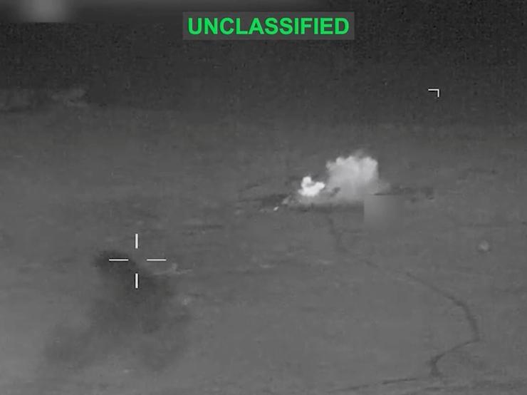 Smoke rises at an unknown location following what the U.S. Central Command says is a new wave of strikes against Iran.