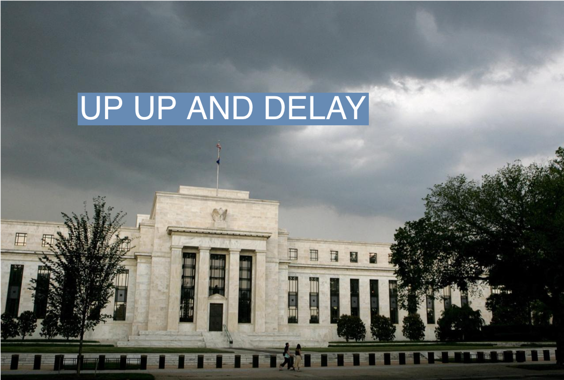 Early summer storm clouds gather over the U.S. Federal Reserve Building.