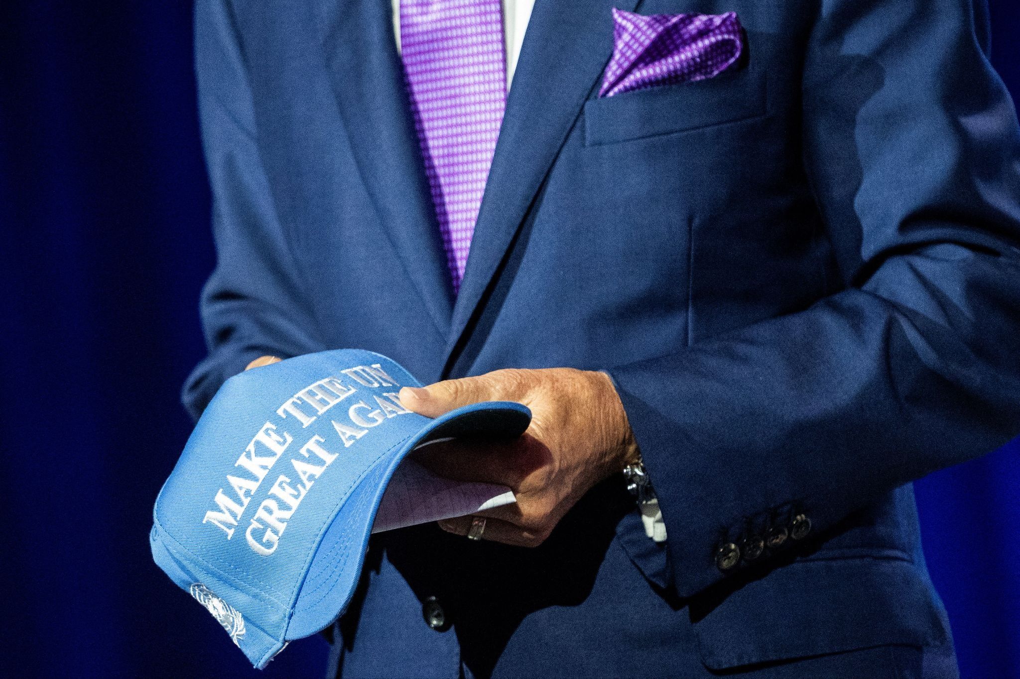 Ralph Reed holds a MAGA cap