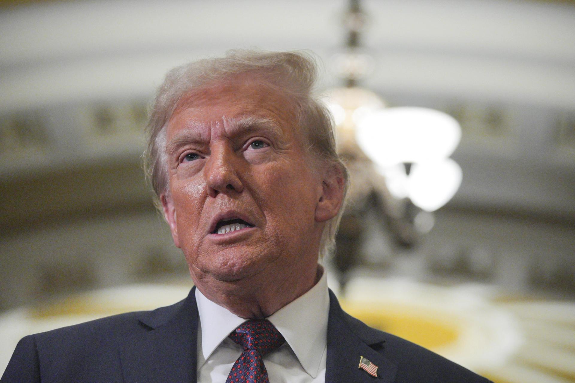 US President-elect Donald Trump speaks after a meeting with Republicans in Congress at the US Capitol building in Washington.