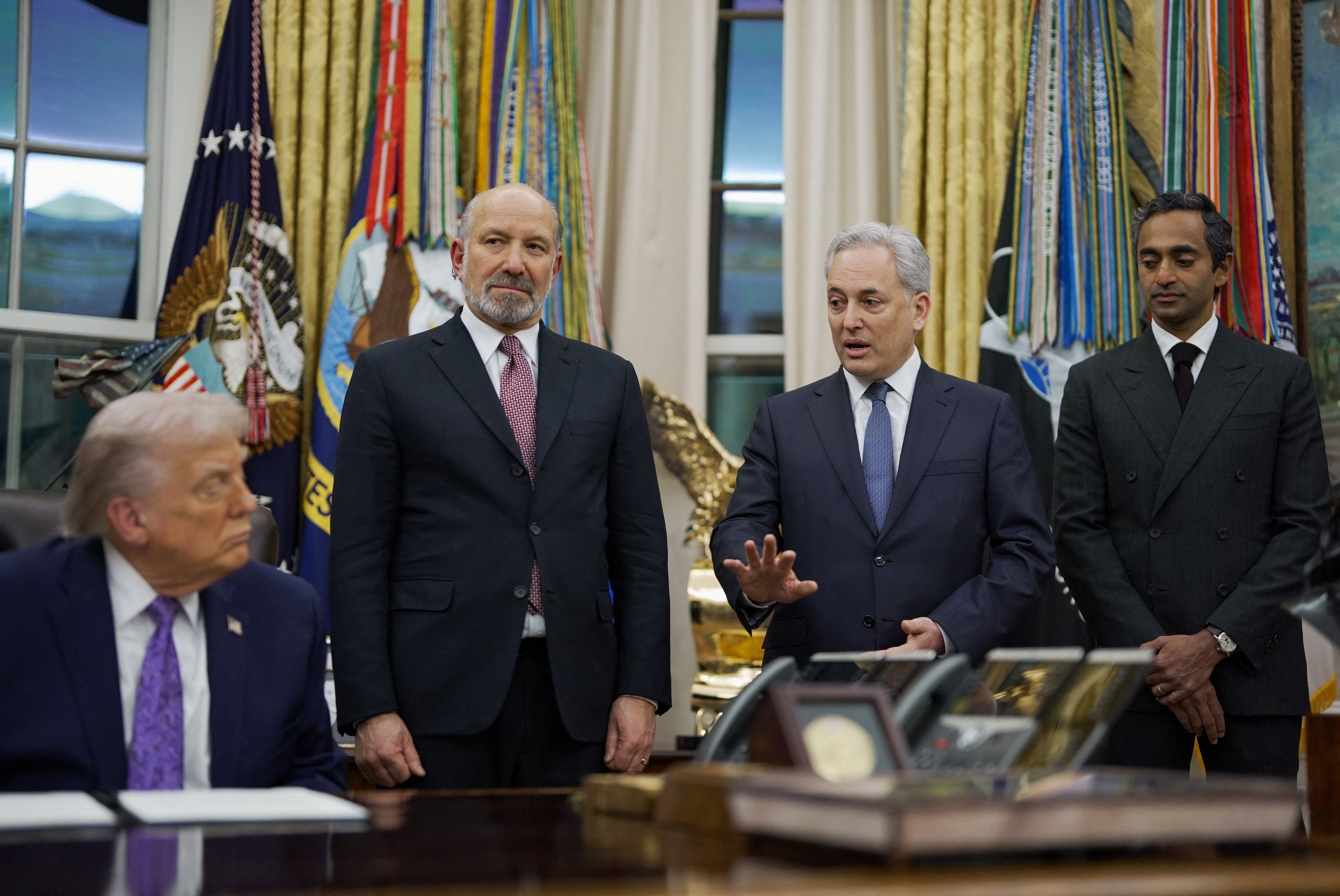 David O. Sacks, Chair of the President’s Council of Advisors on Science and Technology, speaks to U.S. President Donald Trump next to Sriram Krishnan, Senior White House Policy Advisor on Artificial Intelligence, U.S. Senate Commerce Committee Chairman Ted Cruz (R-TX) and U.S. Commerce Secretary Howard Lutnick.