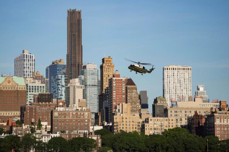 A helicopter flies over Brooklyn