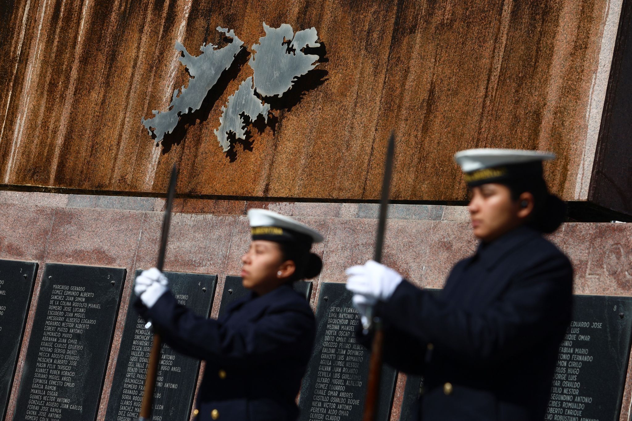 Argentinian soldiers at a Falkland Islands memorial. 