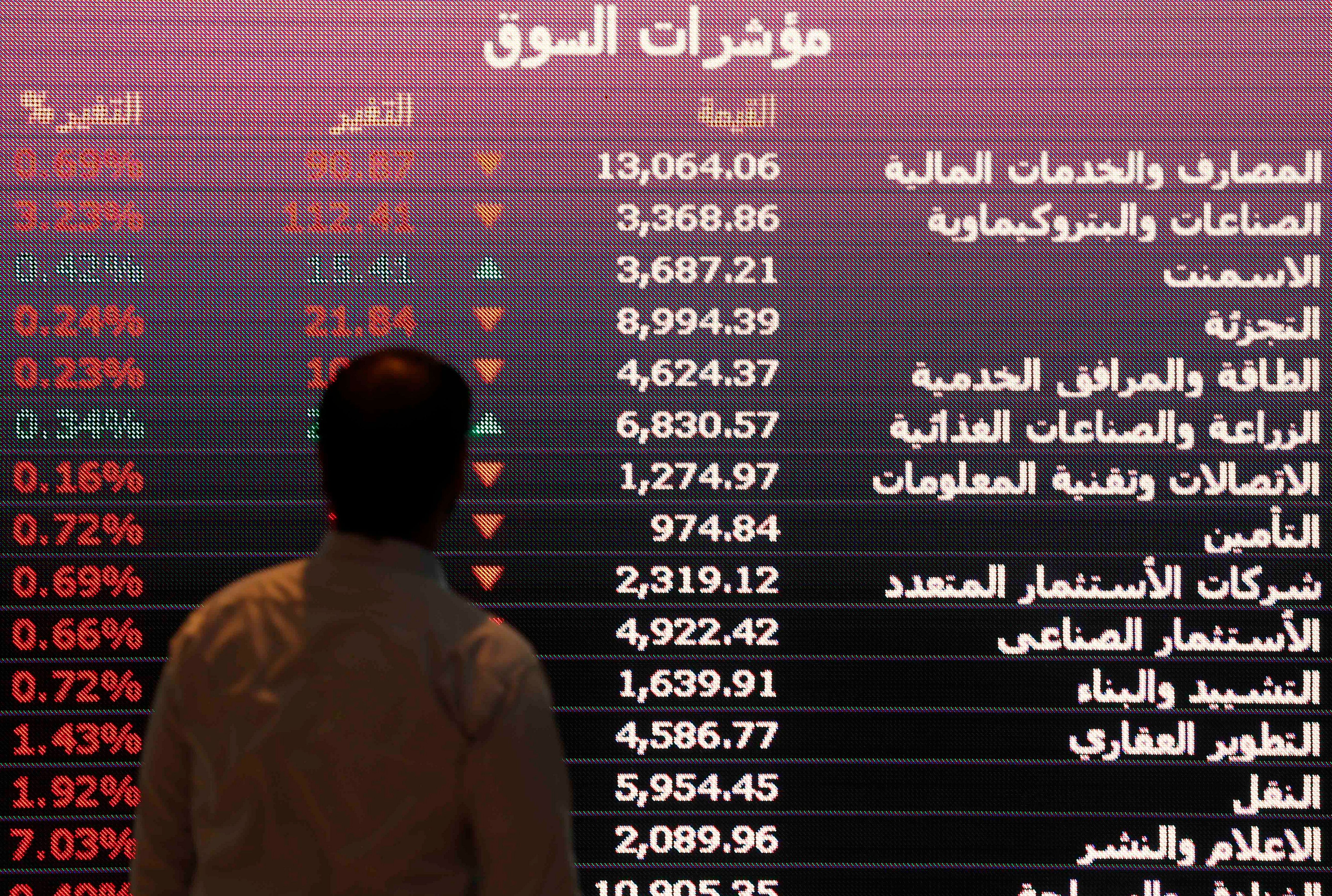 An investor monitors a screen at the Tadawul. 