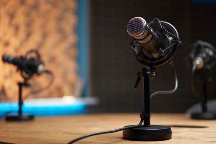 A mic set up on a table.
