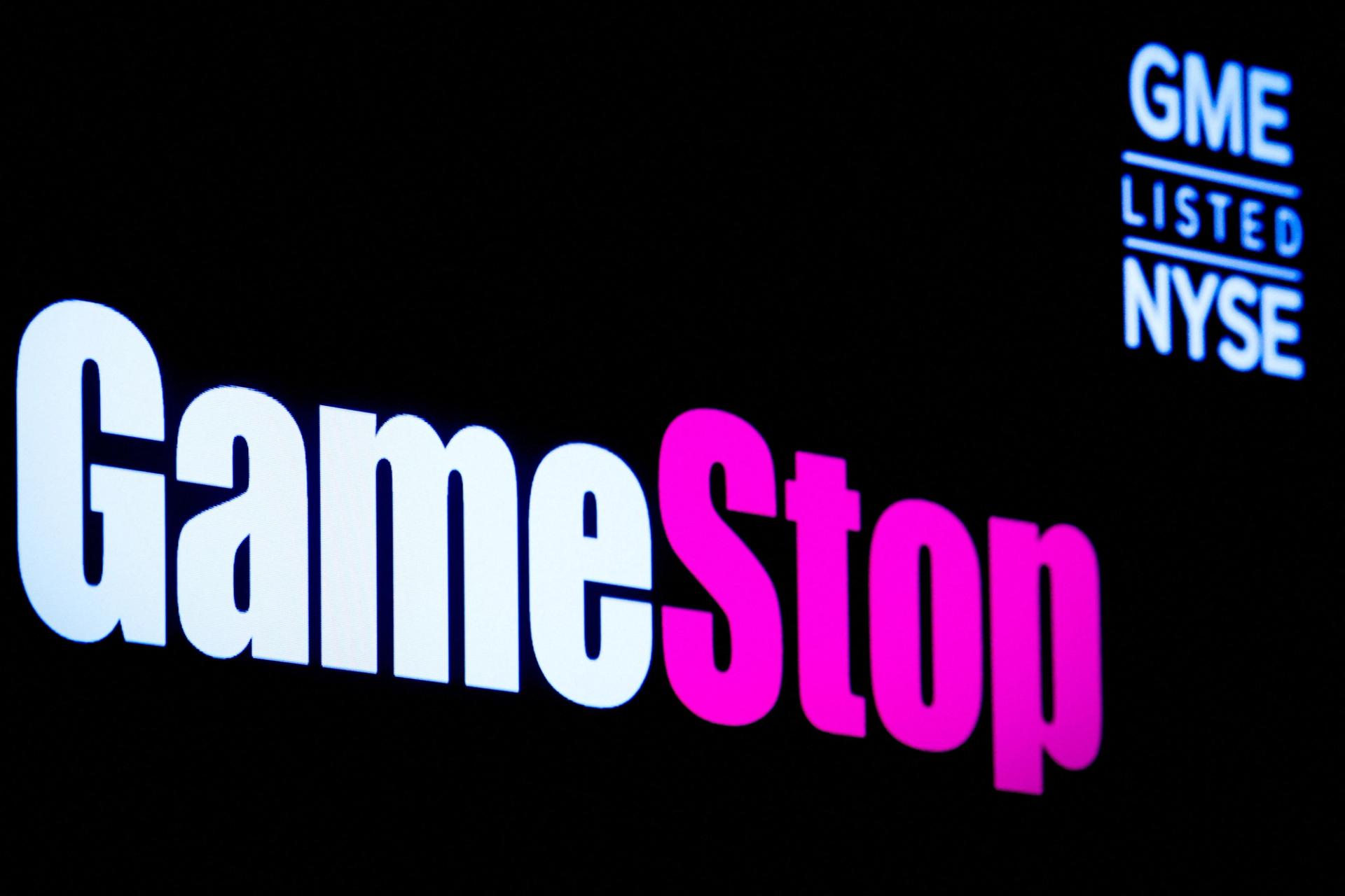 A screen displays the logo for GameStop on the floor of the New York Stock Exchange in New York City on March 29, 2022.