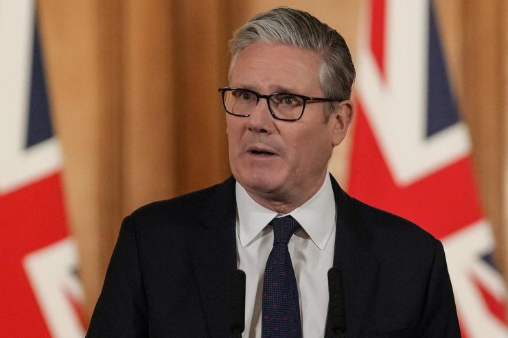 Britain’s Prime Minister Keir Starmer attends a press conference at Downing Street in central London on June 15, 2026, to announce government action to protect children online.