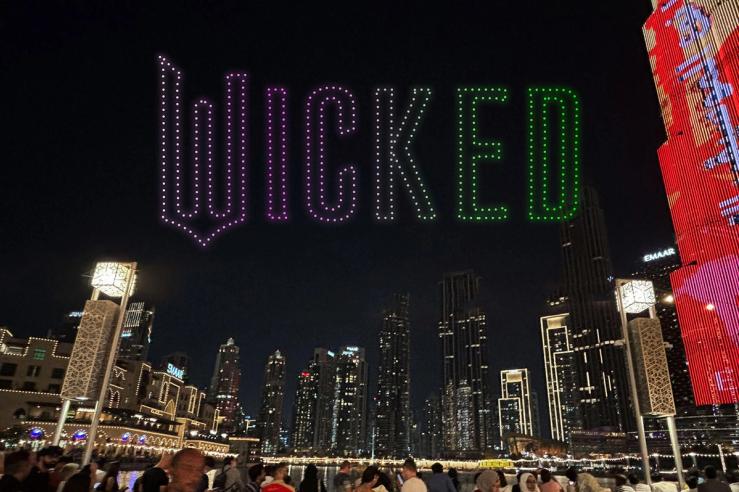 A Wicked drone display next to the Burj Khalifa.