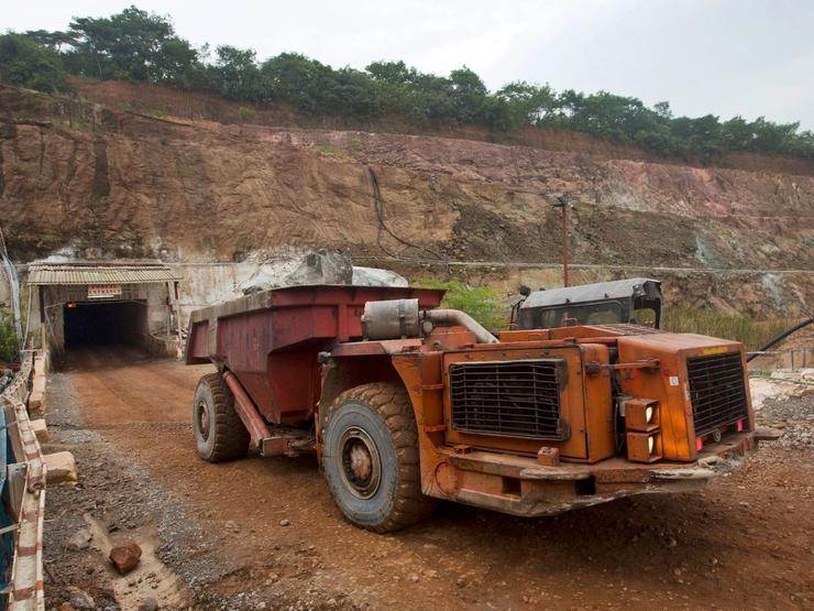 A truck exits the mine after collecting ore from 516 meters below the surface.