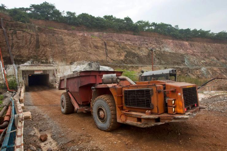 A truck exits the mine after collecting ore from 516 meters below the surface.