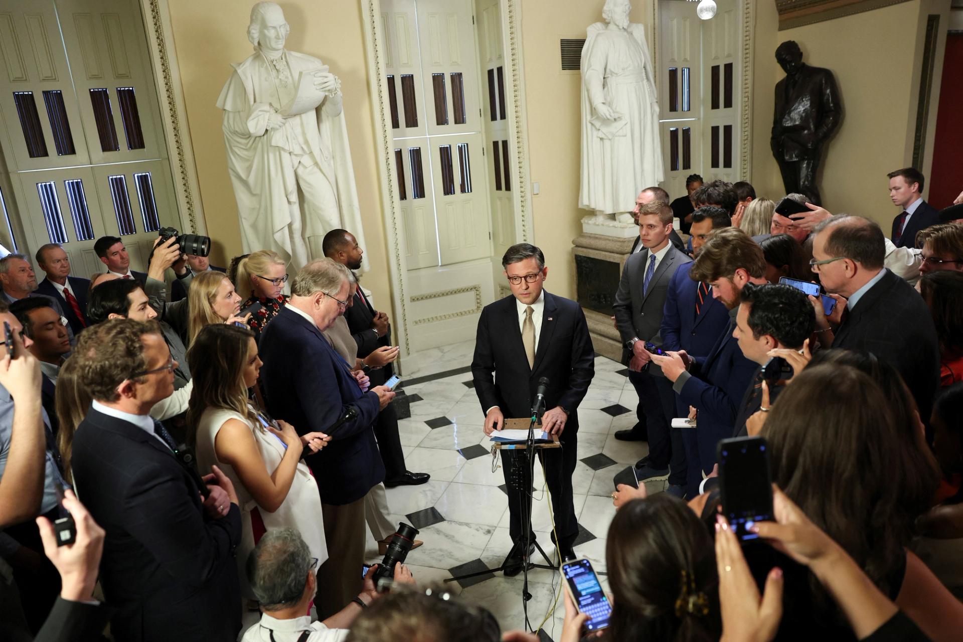 Mike Johnson holds a press gaggle