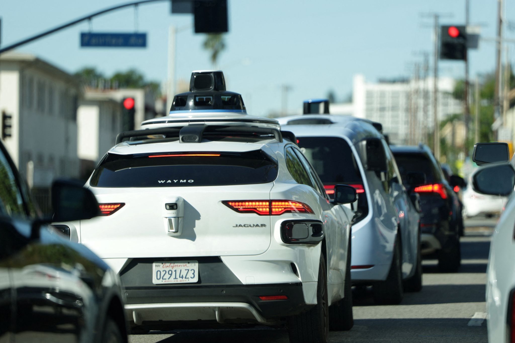 Waymo vehicles in traffic